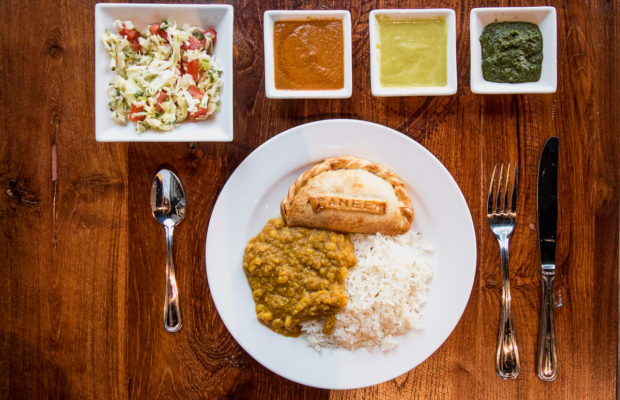Paneer empanada, dahl, and rice at Bombolé Eatery (Credit: Jackie Tran)