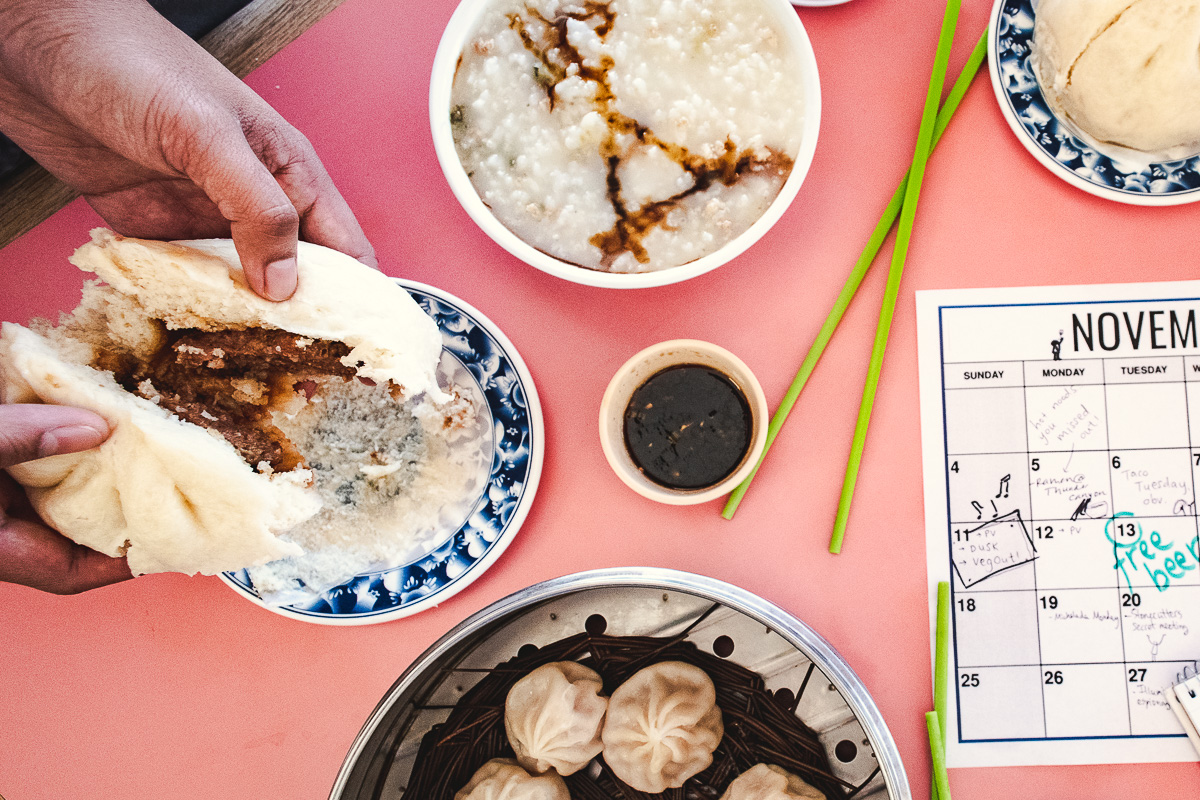 Pork bun, gruel, pork steamed buns (soup dumplings), and tea egg at China Past House (Credit: Kate Severino)