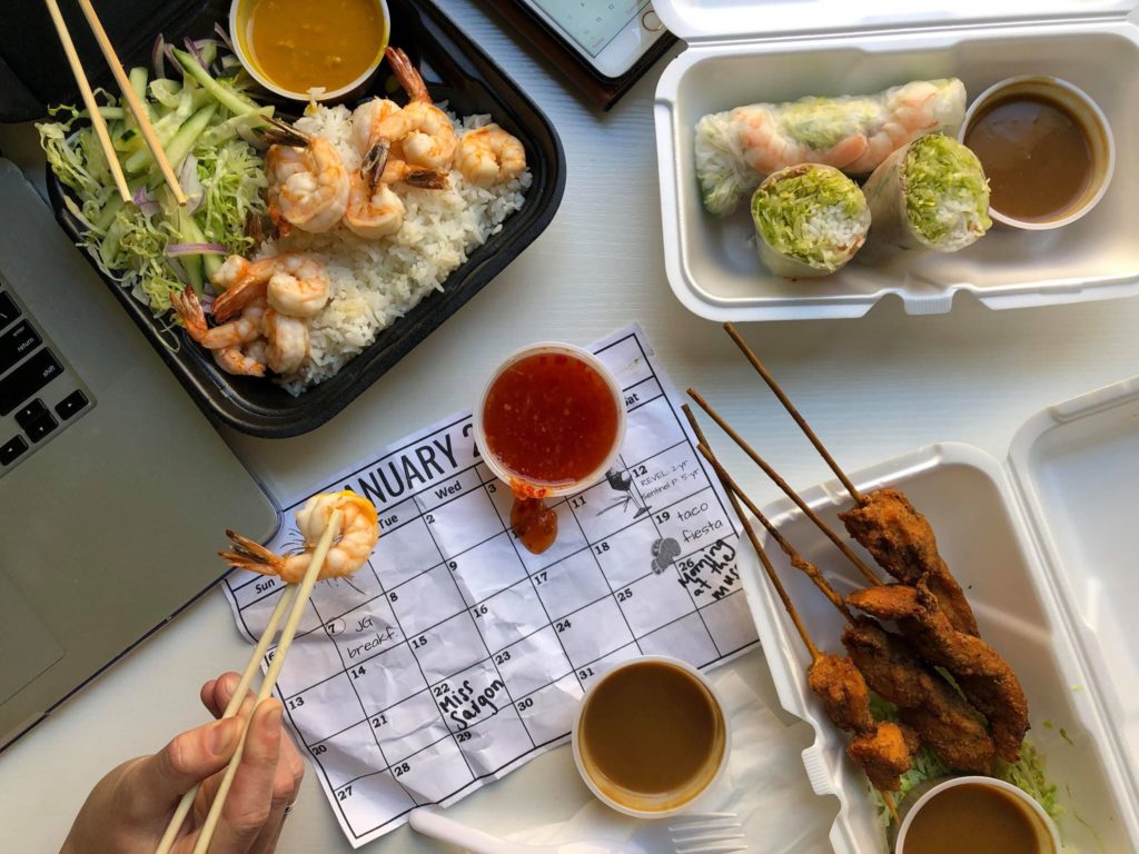 Grilled Shrimps topped with Coconut Curry Sauce on Jasmine Rice, Vietnamese Spring Rolls and Grilled Chicken Skewers from Miss Saigon (Credit: Melissa Stihl)