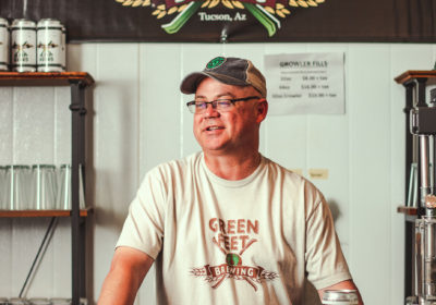 Scott Petersen behind the bar at Green Feet Brewing (Credit: Jackie Tran)