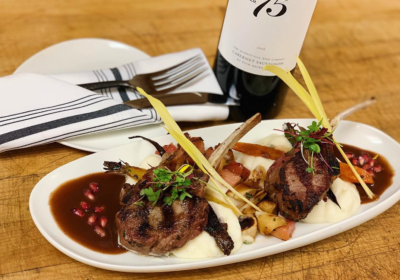 Fess Parker Winery Grilled Lamb Chops, Roasted Garlic Whipped Potatoes, Agave Nectar Glazed Local Root Vegetables, Pomegranate Demi Glacé (Photo courtesy of FARM Provisions on Facebook)