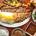 Tour of Persia platter, lavash bread, sabzi, Homemade Yogurt & Garlic Dip (Mast o Moosier), Kash O'Bademjan, and Gheimeh Bademjan at Persian Room