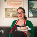 Kylie Myers with cannoli at 4th Avenue Delicatessen (Credit: Jackie Tran)