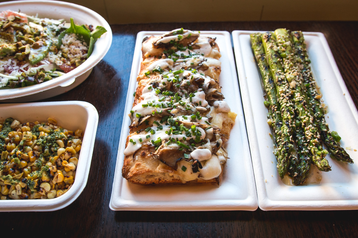 Funghi Roman Pizza and Grilled Asparagus at Posto Sano Foods (Credit: Jackie Tran)