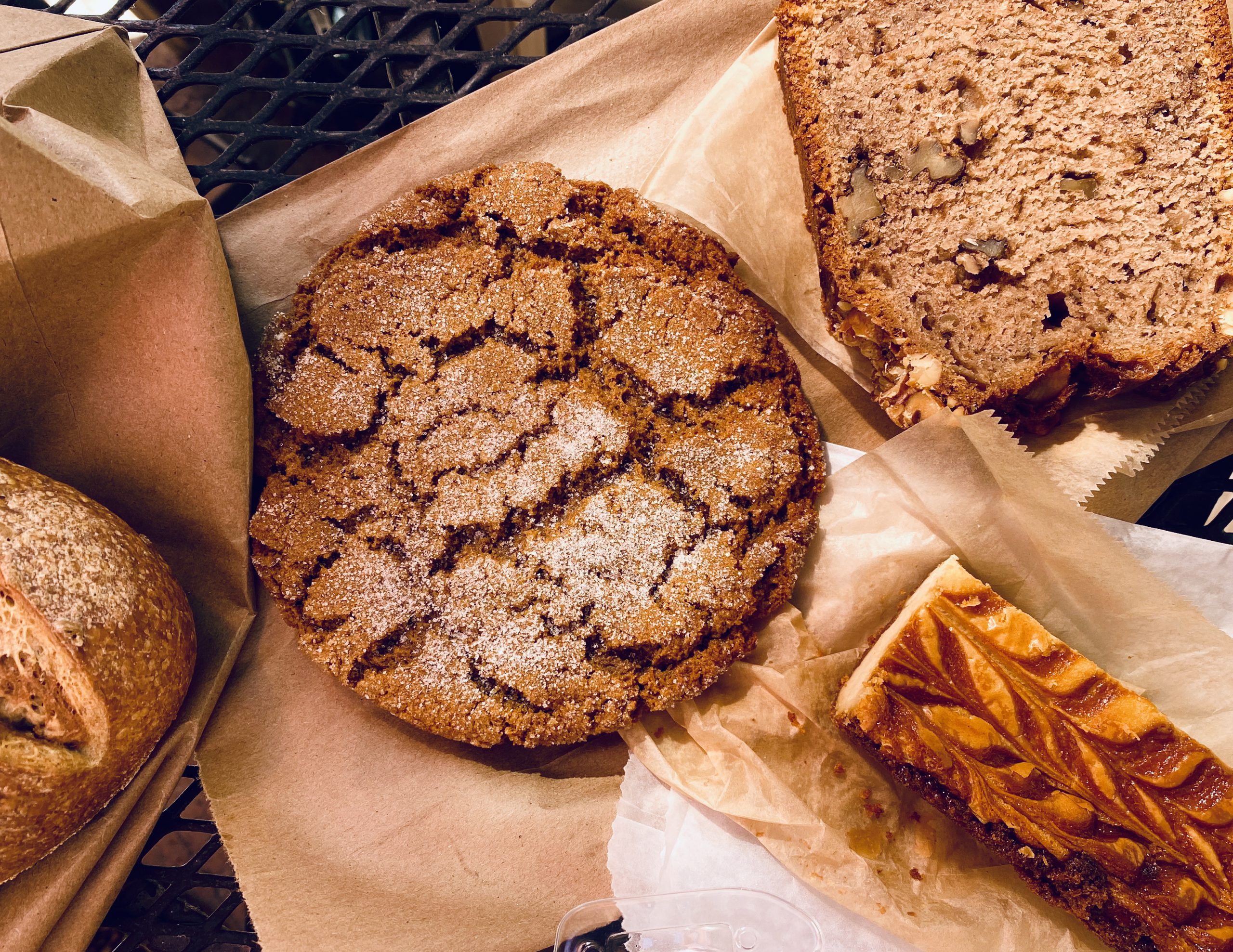 A molasses cookie and baked treats from CERES