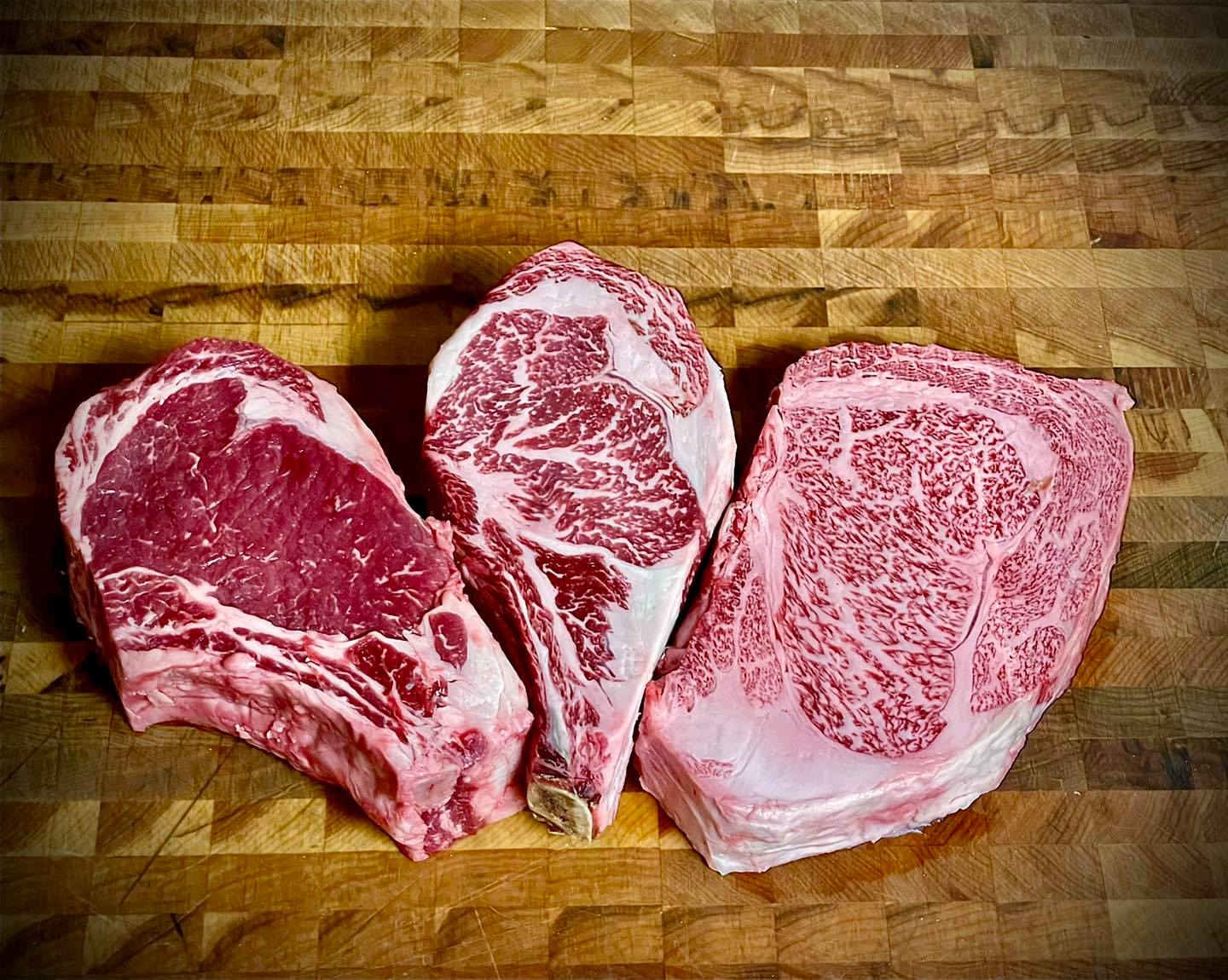 a picture of raw steaks