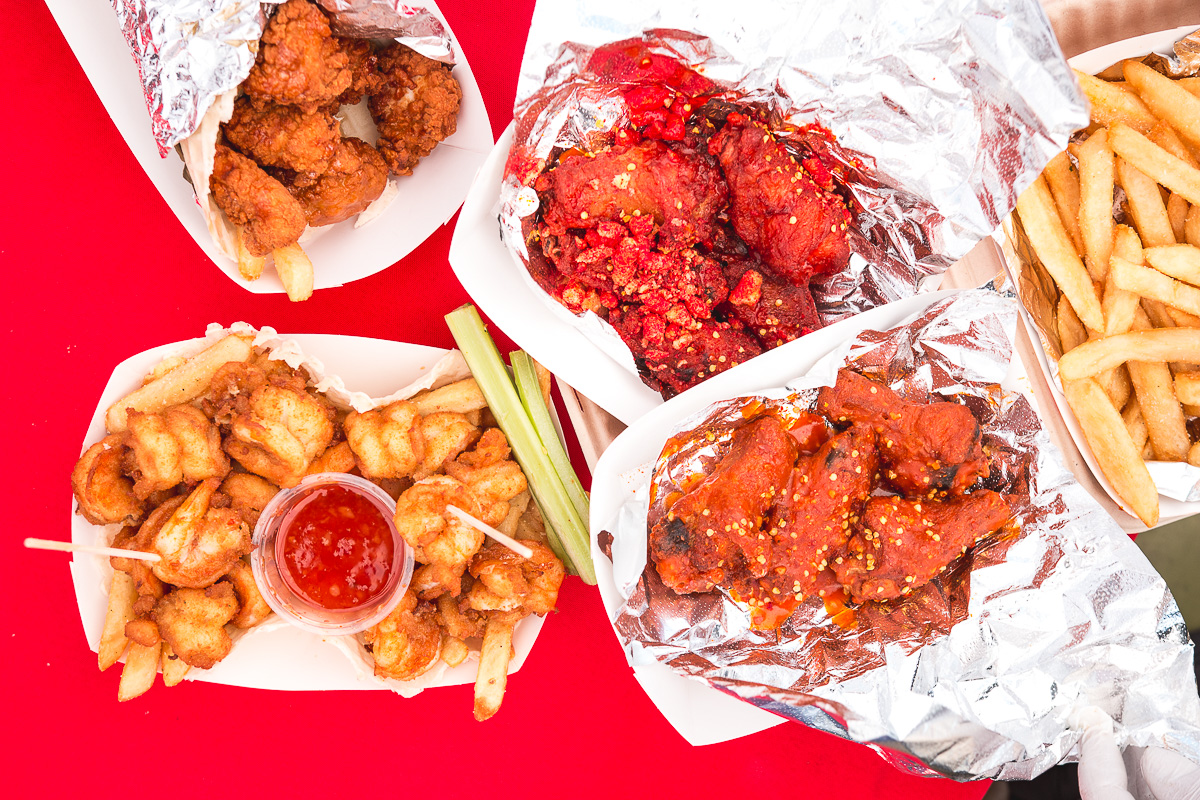 Chicken n Cone, Chili Chamoy Wings, Shrimp Bowl, and Buffalo Wings at Foxy Roxy's Chicken n Cone (Credit: Jackie Tran)