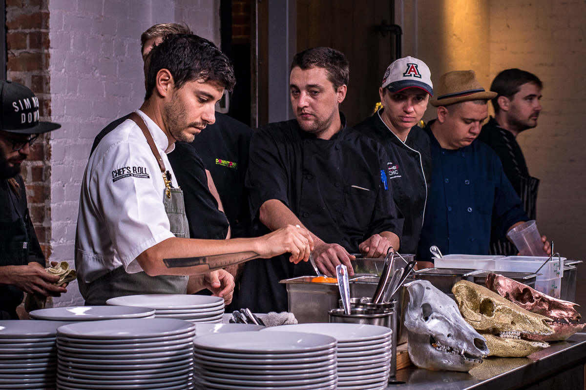 Chefs plating at a Gastronomic Union of Tucson (GUT) dinner at the Carriage House (Credit: Jackie Tran)