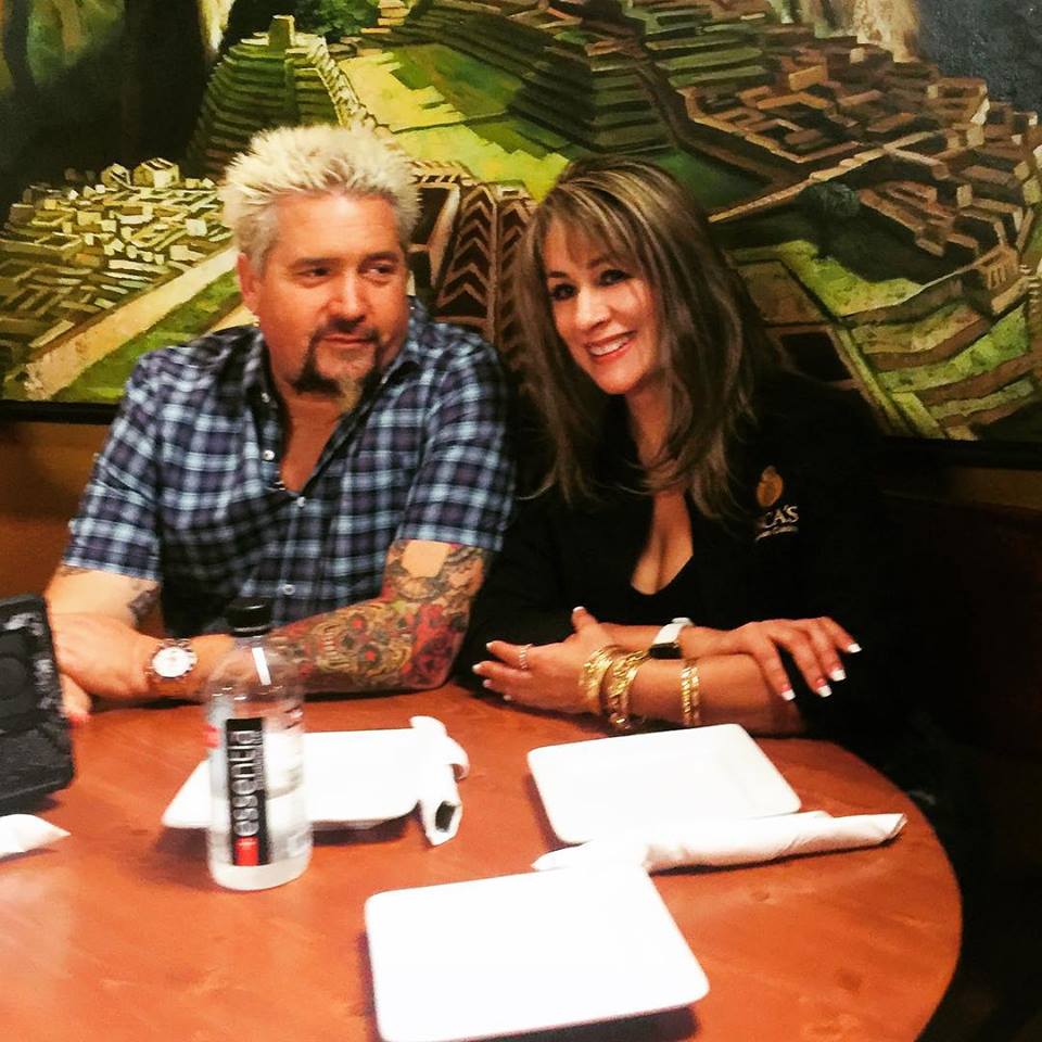 Diners, Drive-Ins and Dives host Guy Fieri and Inca's Peruvian Cuisine owner Fatima Campos (Credit: Inca's Peruvian Cuisine on Facebook)