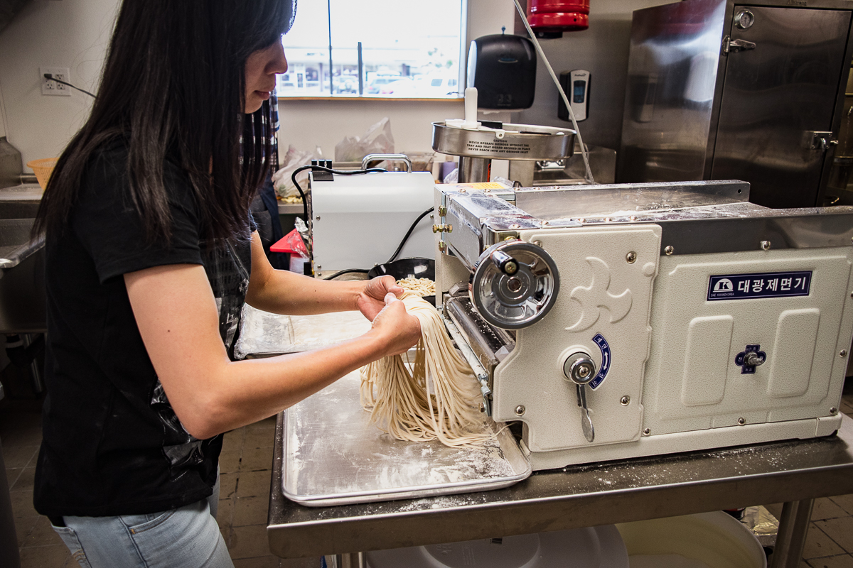 Claire Wang making noodles at Noodleholics (Credit: Jackie Tran)