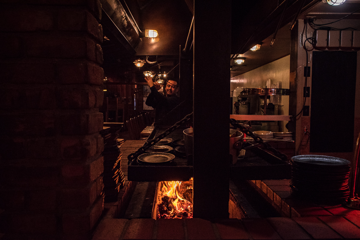 Mario Alva at the grill pit at Silver Saddle Steakhouse (Credit: Jackie Tran)