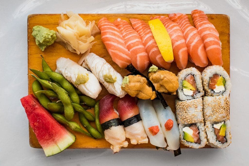 an array of sushi on a platter