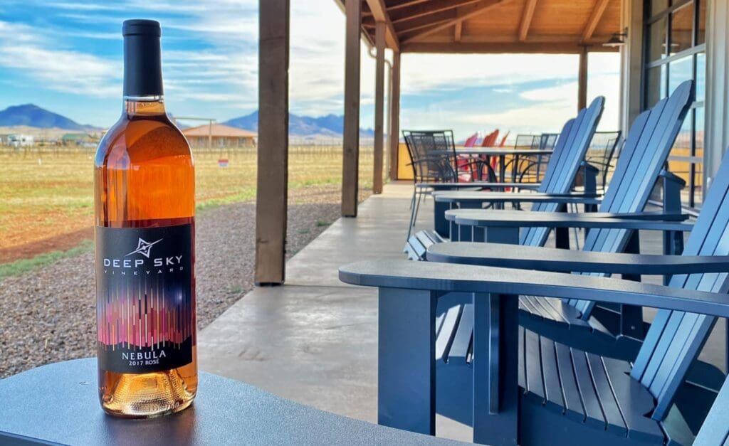 a bottle of ros&eacute; wine on a table