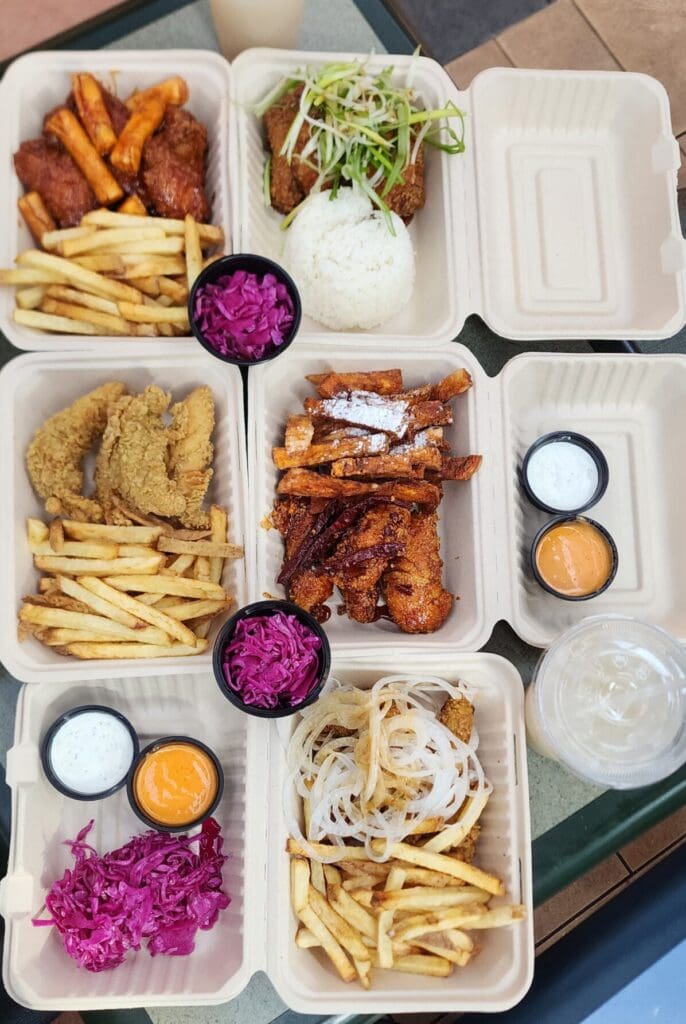 a box filled with different types of food on a table