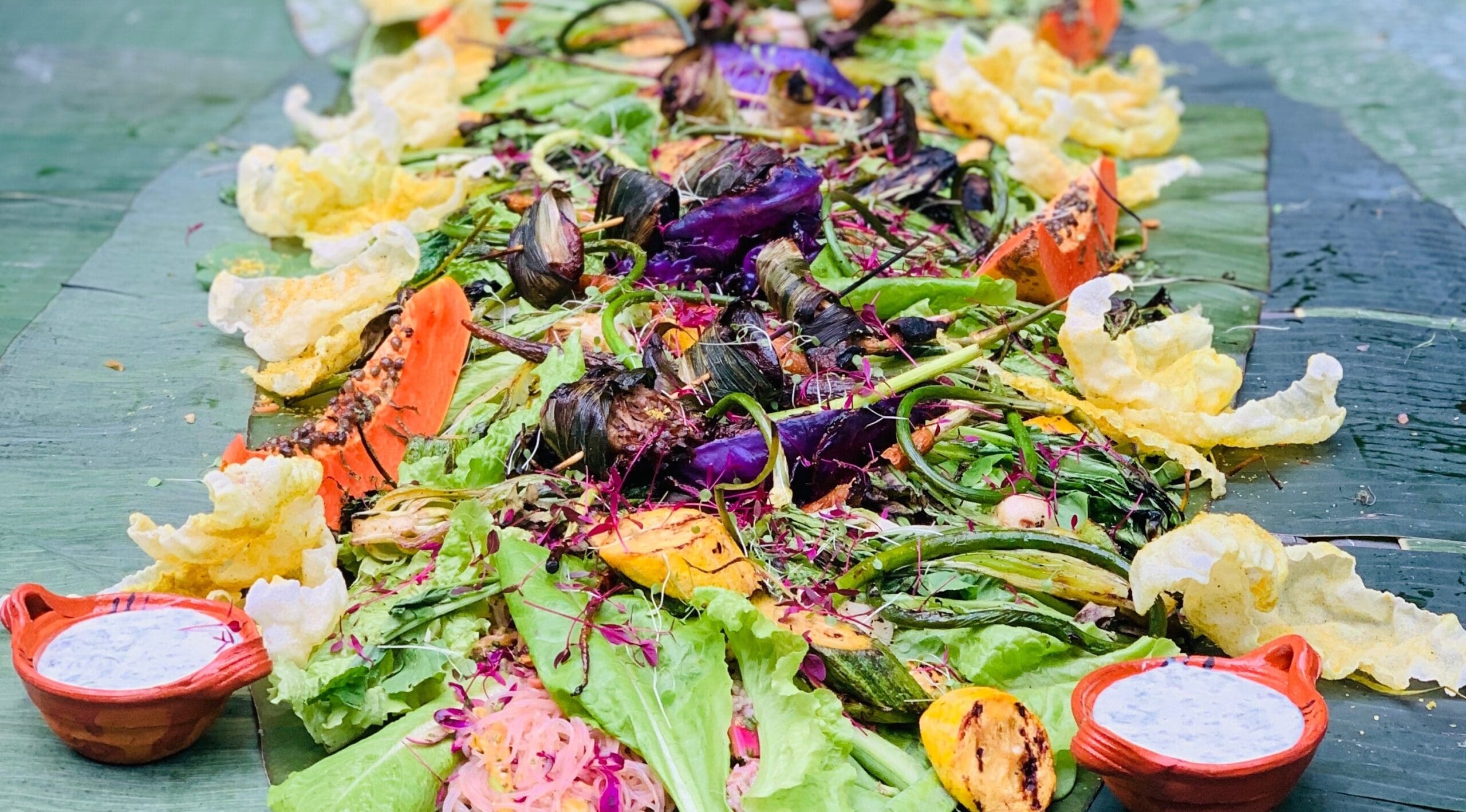 a plate of pizza and a salad