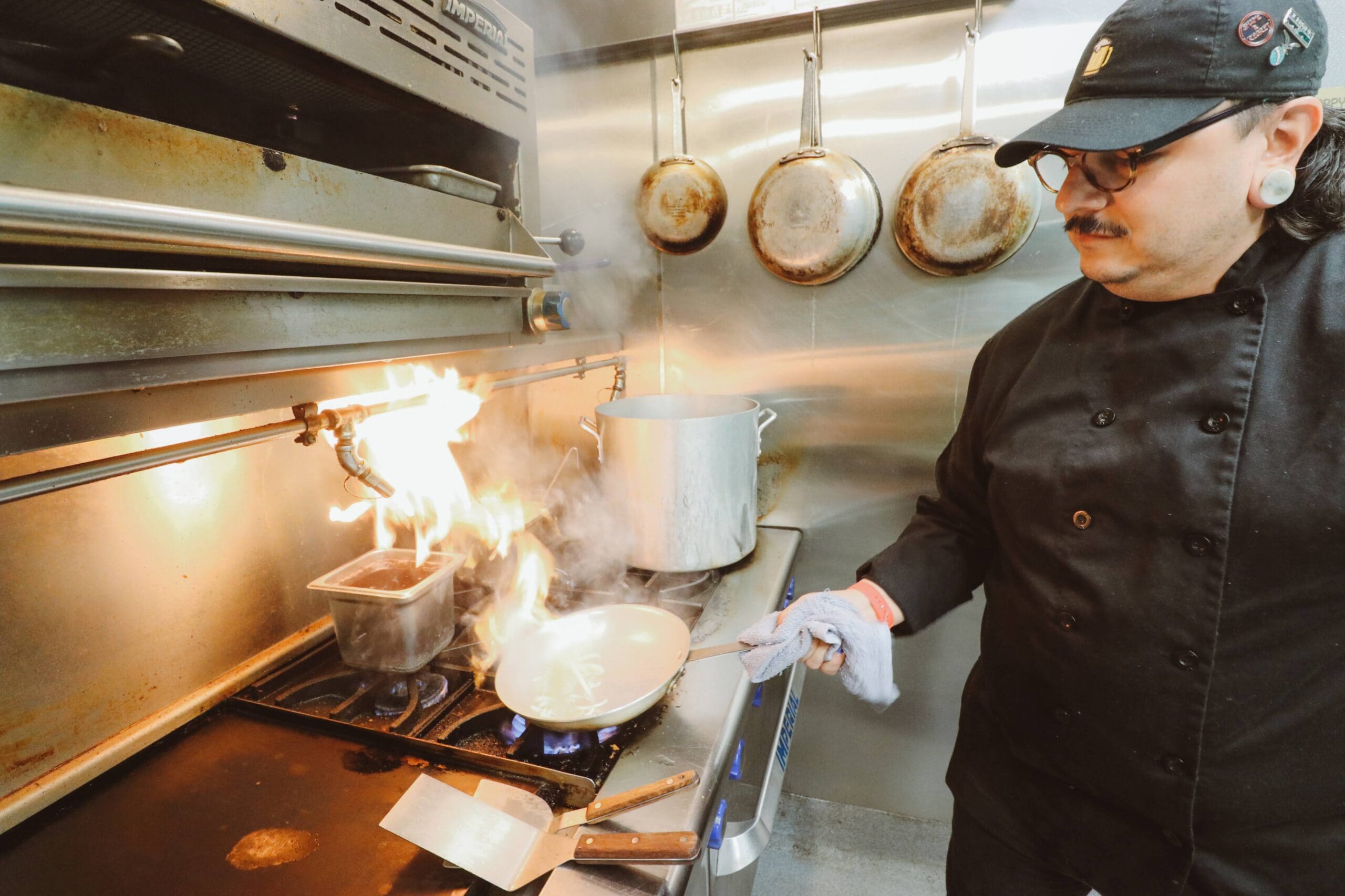 a man cooking in a kitchen