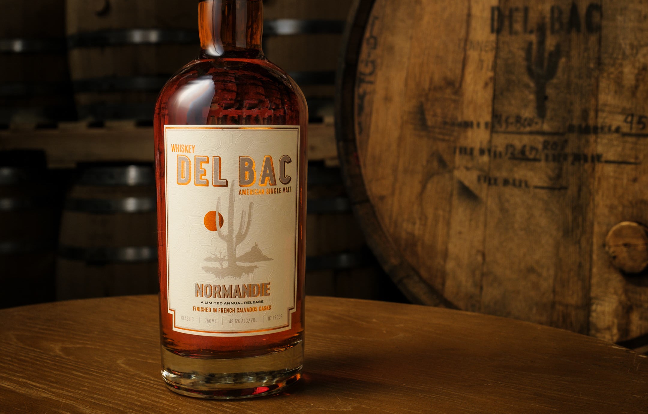 a glass bottle sitting on a table