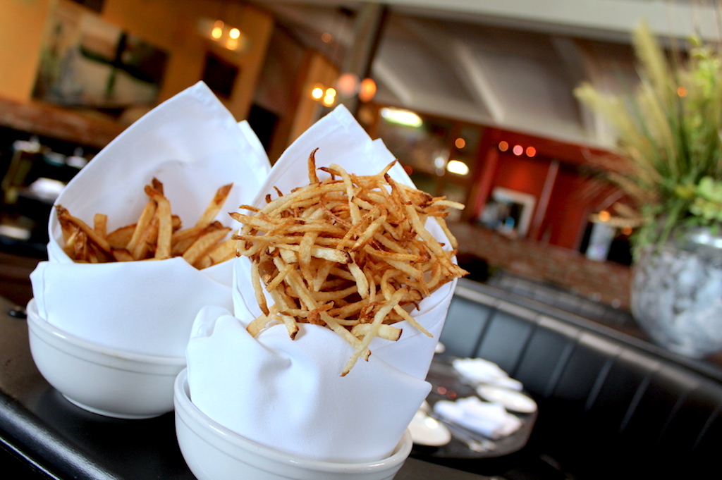 french fries sitting on top of a table