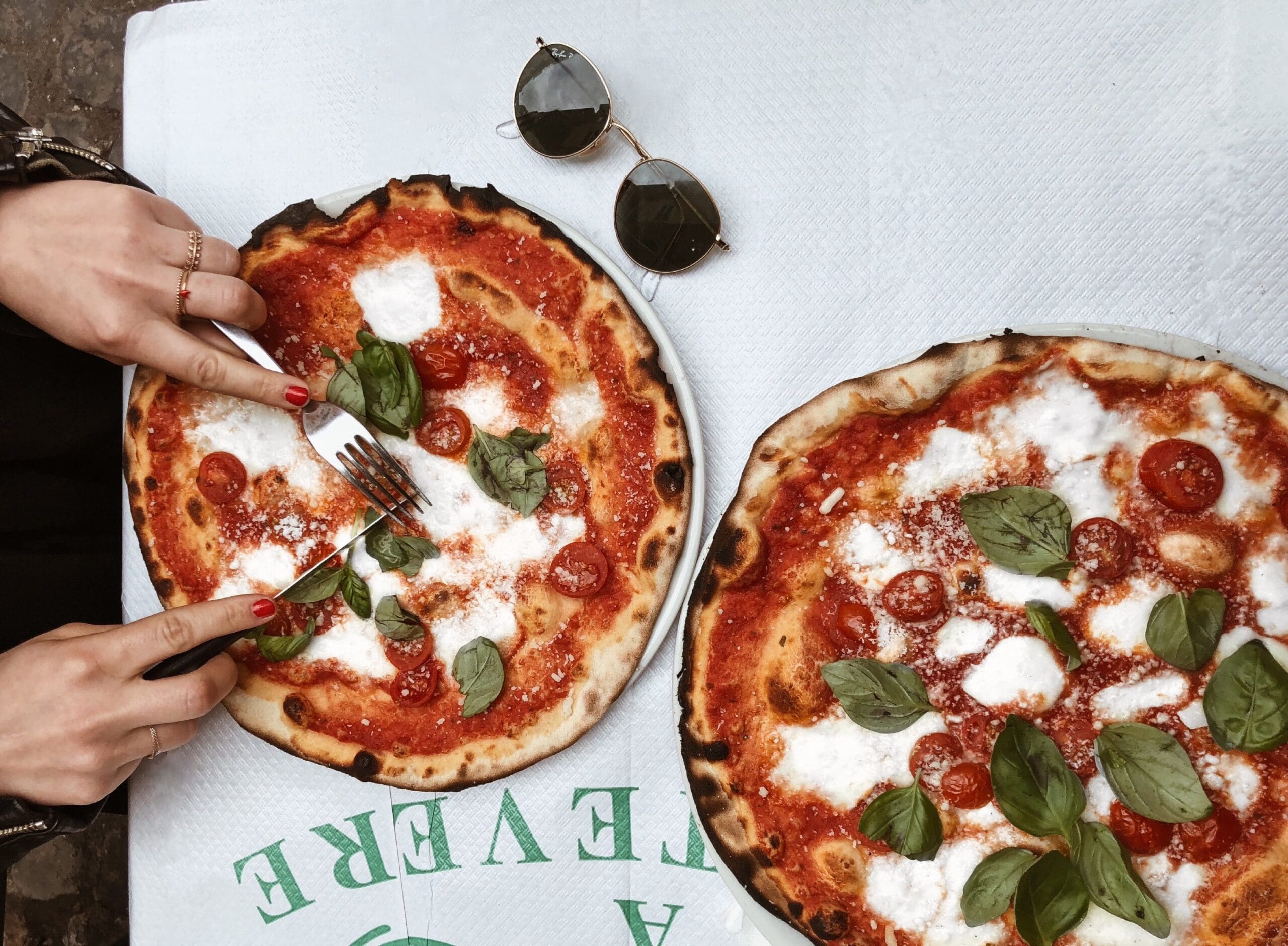 a plate of food with a slice of pizza