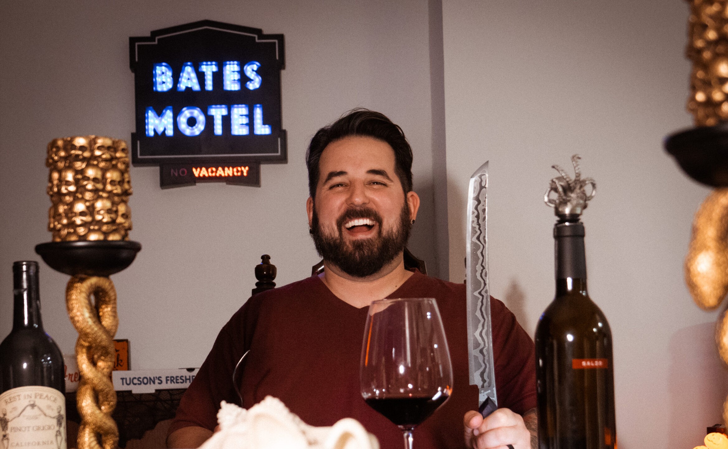 a man holding a glass of wine