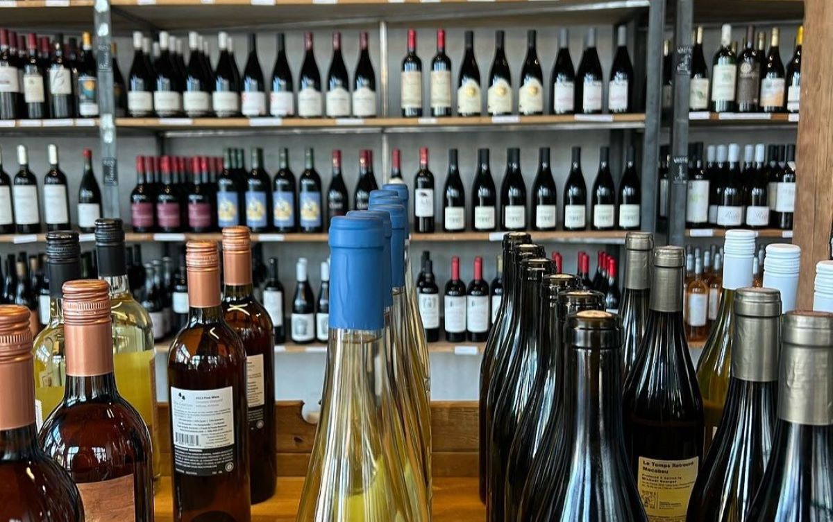 a bottle of wine and glasses