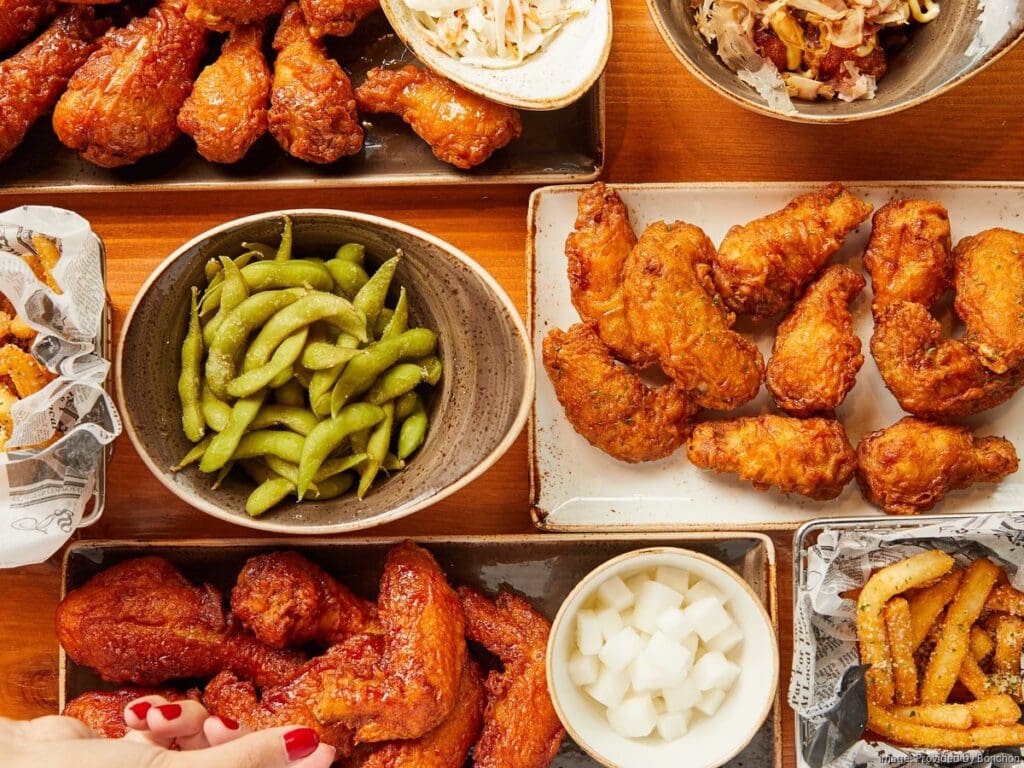 a bunch of different types of food on a table