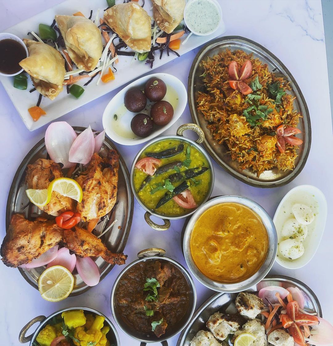 a dish is filled with different types of food on a table