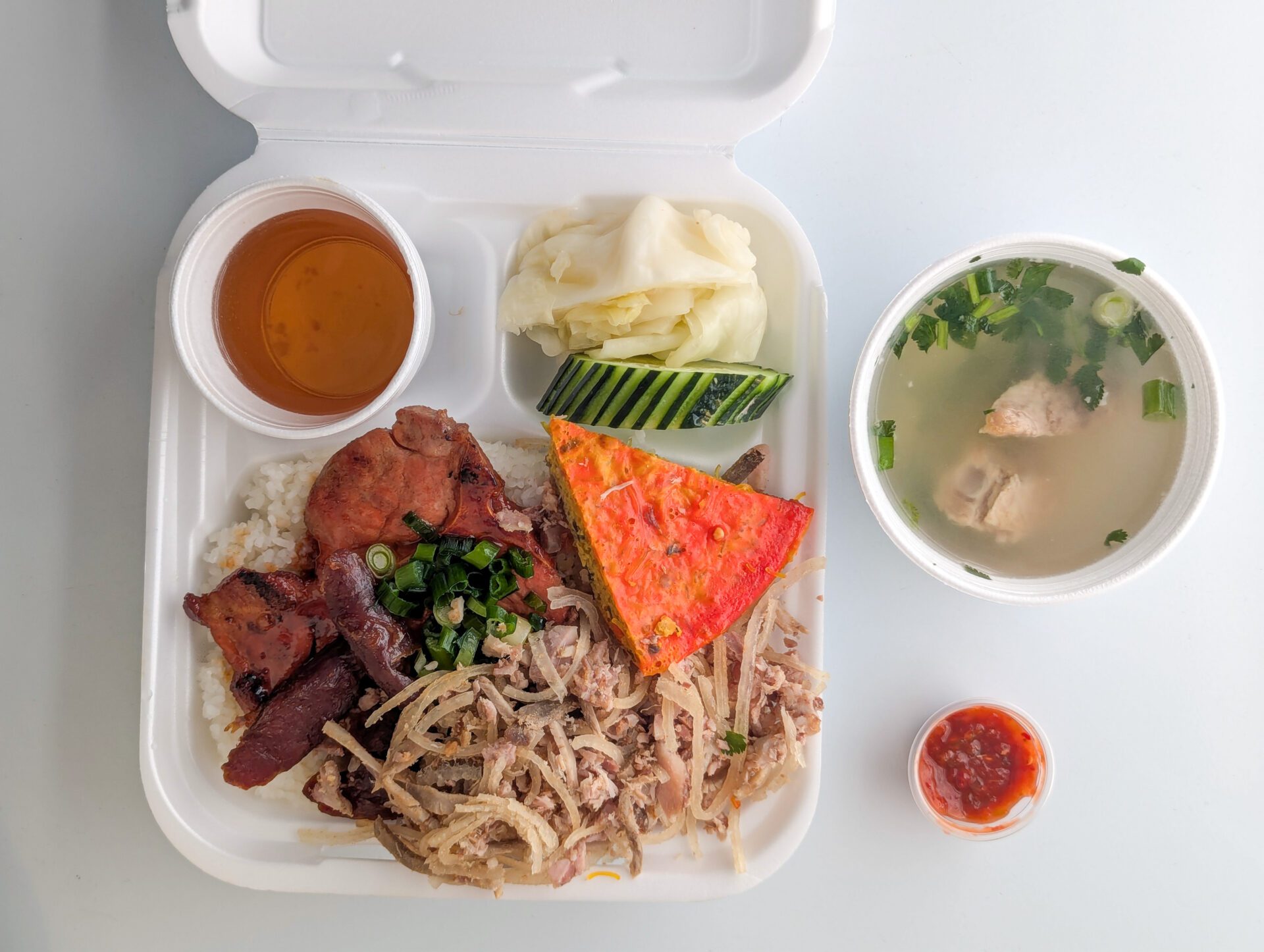 To-go order of com tam bi cha suon nuong lap xuong from Com Tam Thuan Kieu (photo by Jackie Tran)