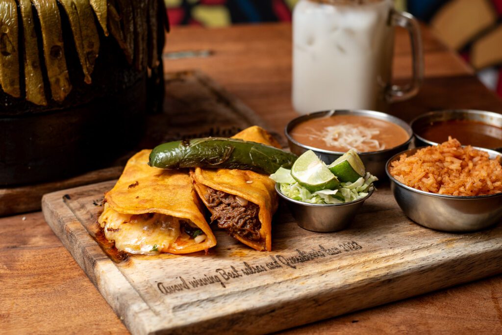 Quesabirrias with rice, beans, and caldo at Amelia's Mexican Kitchen on Oracle Road (Photo by Jackie Tran)