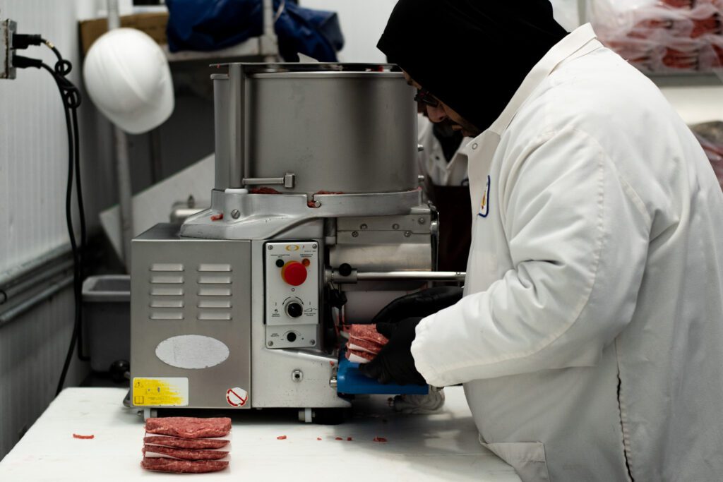 Ground beef patty forming at Merit Foods of Arizona (Photo by Jackie Tran)