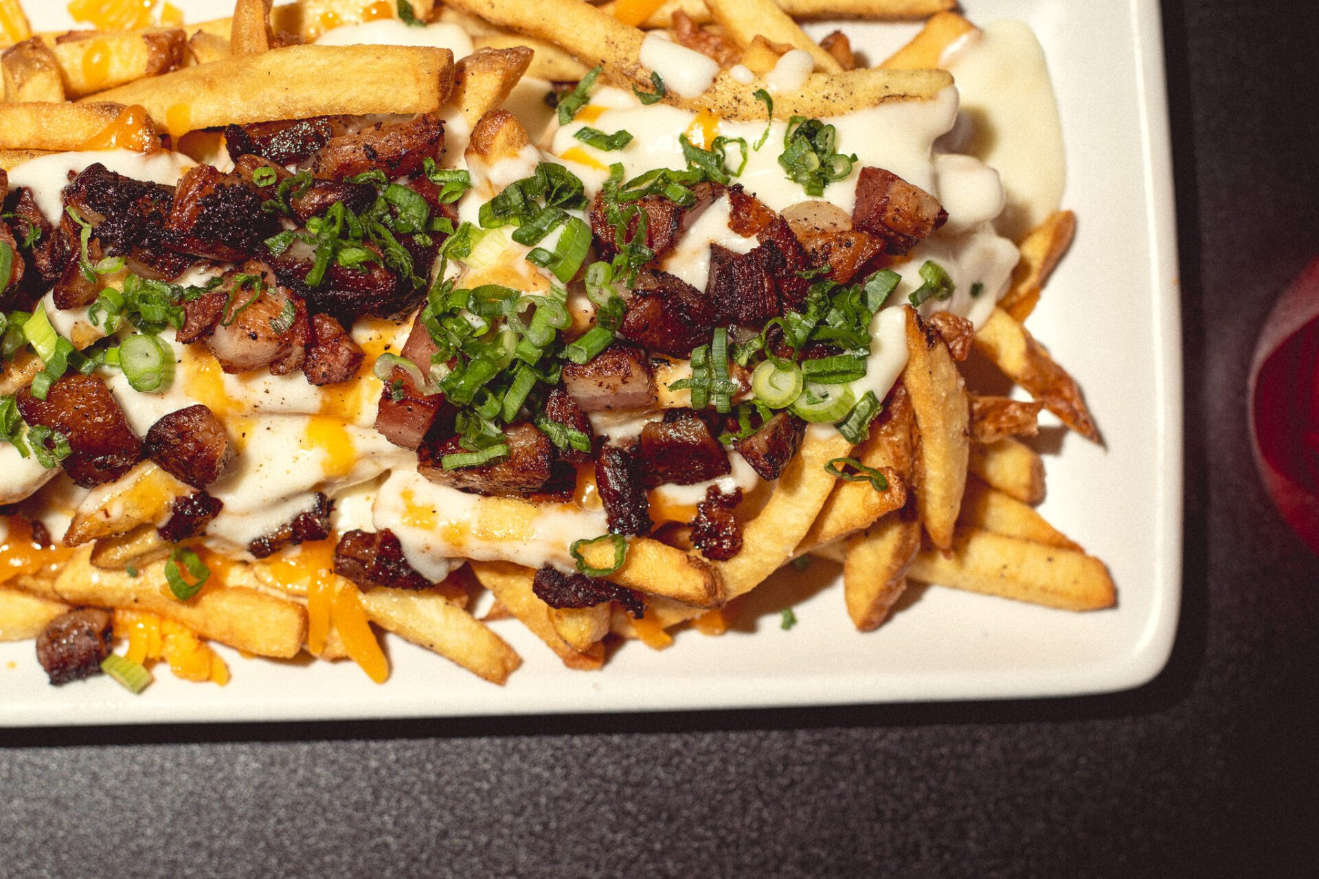 Bacon Loaded Fries at Tandem American Eatery (Photo by Jackie Tran)