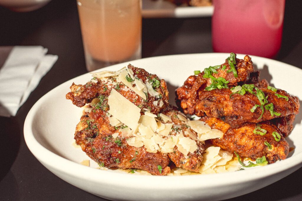 Garlic Parmesan and Hot Wings at Tandem American Eatery (Photo by Jackie Tran)