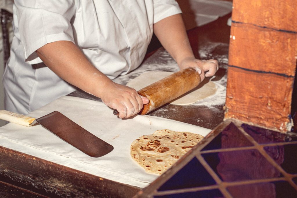 Employee making flour tortillas at Guadalajara Original Grill on Prince Road (Photo by Jackie Tran)