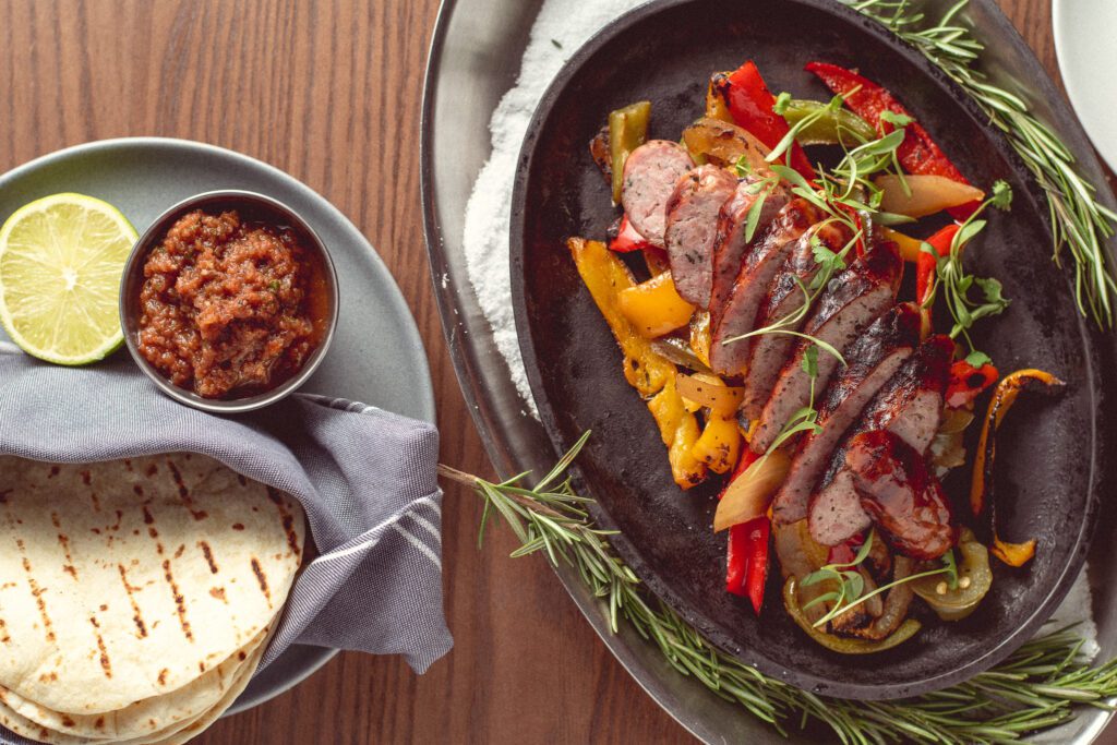 Rabbit and Rattlesnake Sausage at Flying V Bar & Grill (Photo by Jackie Tran)