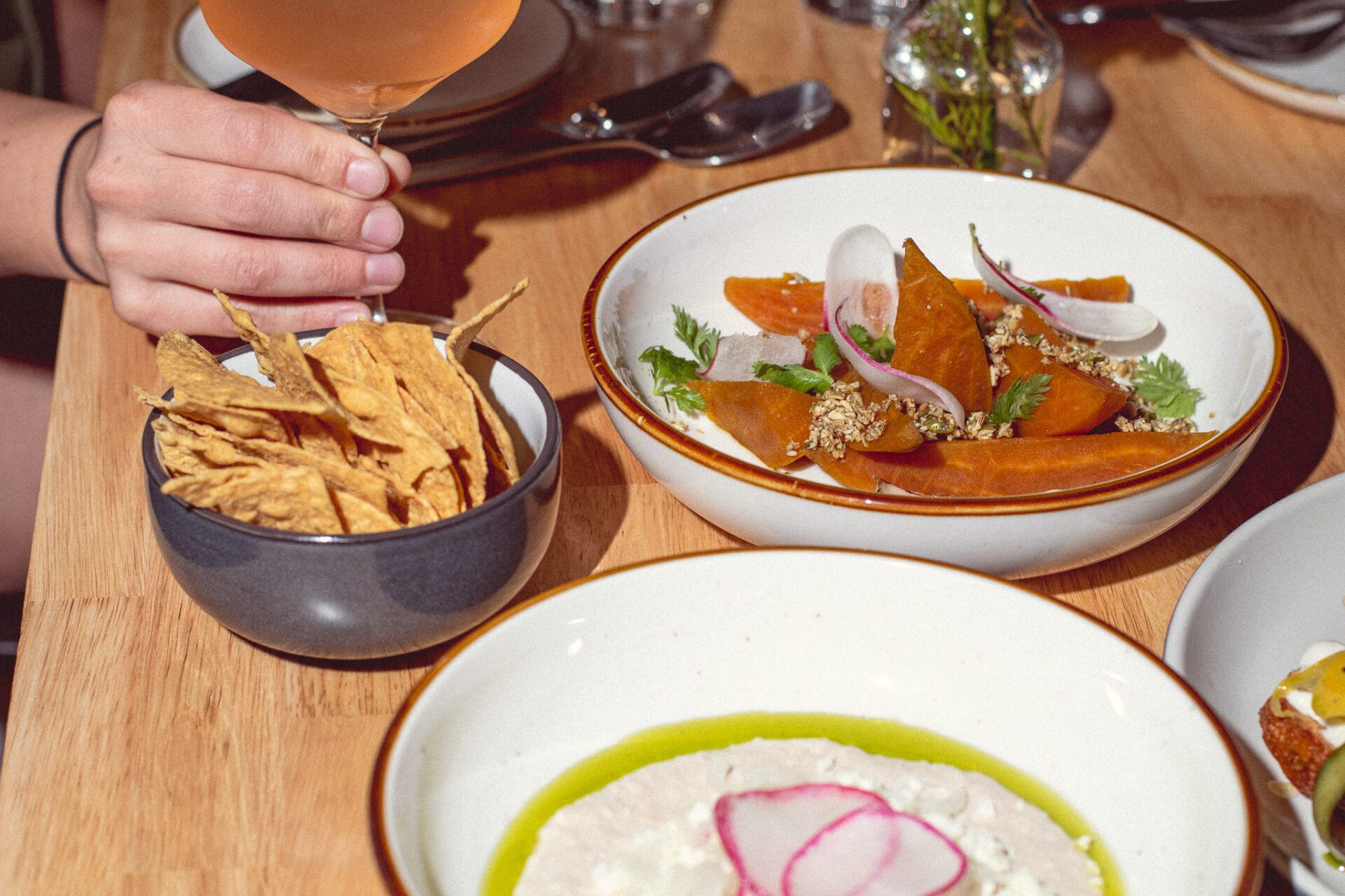 Spritz, Barbacoa Beets, and Pinto Hummus at Sunshine Wine (Photo by Jackie Tran)