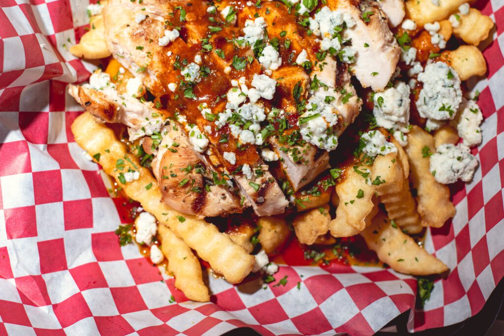 Buffalo Fries with rosemary grilled chicken breast at Rocco's LIttle Chicago Pizzeria (Photo by Jackie Tran)