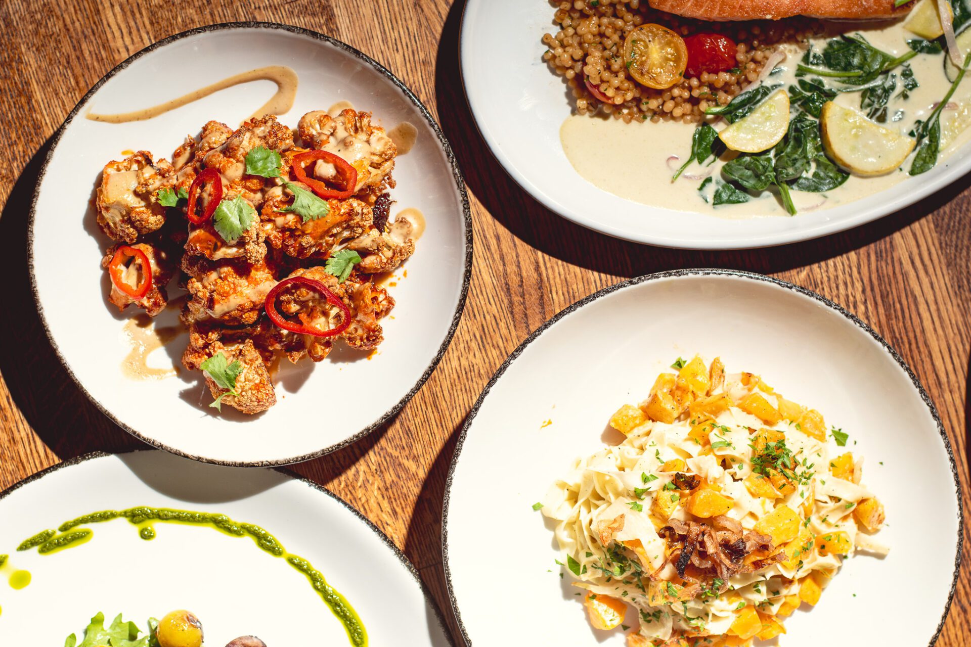 Cauliflower and other dishes at Figs Oven + Enoteca (Photo by Jackie Tran)