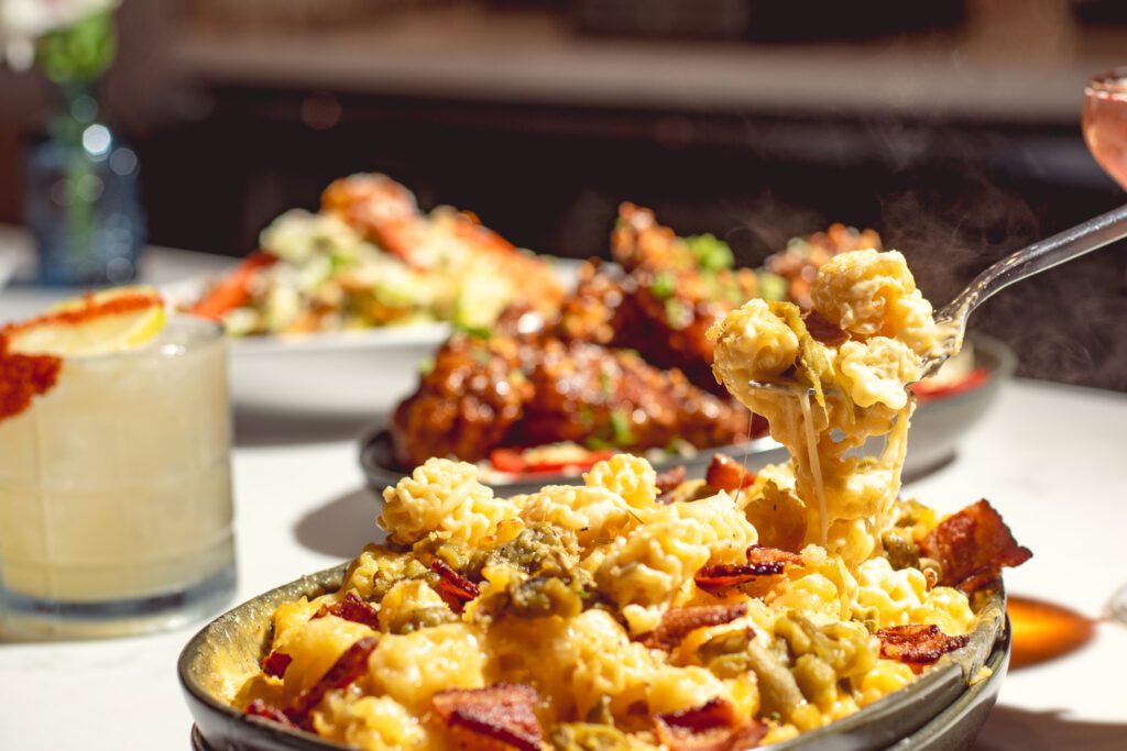 Mac & Cheese with thick-cut bacon and roasted green chiles at Redbird Scratch Kitchen + Bar Midtown (Photo by Jackie Tran)